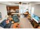Spacious living room featuring an open floor plan and a view of the kitchen and dining area at 411 Freeland Way, Moncks Corner, SC 29461
