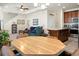 Bright and airy open-concept living space seamlessly connecting the living, dining, and kitchen areas at 411 Freeland Way, Moncks Corner, SC 29461