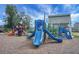 Community playground with slides, climbing structures, and cushioned ground cover offers fun outdoor activity at 411 Freeland Way, Moncks Corner, SC 29461