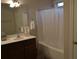 Bathroom featuring a tub, vanity, towel rack, and neutral colors at 4210 Scharite St, Charleston, SC 29414