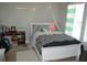 A cozy bedroom with a bed, desk, and window offering a comfortable space at 4210 Scharite St, Charleston, SC 29414