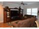Comfortable living room with a plush, oversized brown sofa and a large media center at 4210 Scharite St, Charleston, SC 29414