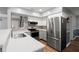 Kitchen with stainless steel appliances, modern countertops and white cabinets at 422 Temple Rd, Ladson, SC 29456