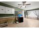 Inviting living room with neutral tile floors, a ceiling fan, and natural light at 422 Temple Rd, Ladson, SC 29456