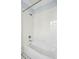 Clean bathroom with a white tiled shower-tub combination and classic fixtures, offering a relaxing space at 43 Montrose Rd, Mount Pleasant, SC 29464