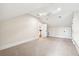 Bright bedroom with neutral carpet, ceiling fan, and doors leading to other rooms at 43 Montrose Rd, Mount Pleasant, SC 29464