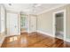 Cozy bedroom with hardwood floors and neutral walls with doorways to other rooms at 43 Montrose Rd, Mount Pleasant, SC 29464
