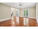 Living room with hardwood floors, recessed lights, crown molding, and views to the adjacent room at 43 Montrose Rd, Mount Pleasant, SC 29464