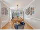 Elegant dining room with an expansive wood table and modern decor at 45 Lyttleton Ave, Charleston, SC 29407
