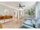 Cozy living room featuring a blue velvet sofa, area rug, and stylish furnishings at 45 Lyttleton Ave, Charleston, SC 29407