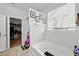 Bright bathroom with soaking tub and a view to the walk-in closet at 514 Morelets Dr, Moncks Corner, SC 29461