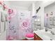 Bathroom with a rose themed shower curtain, decorated toilet and a 'love' script decoration at 514 Morelets Dr, Moncks Corner, SC 29461