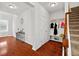 Inviting entryway with hardwood floors, coat rack and decorative mirror for an inviting space at 514 Morelets Dr, Moncks Corner, SC 29461