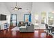Bright living room featuring high ceilings, large windows, and modern furnishings at 514 Morelets Dr, Moncks Corner, SC 29461