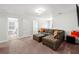 Comfortable living area with a large sectional sofa and media center at 514 Morelets Dr, Moncks Corner, SC 29461