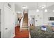Open concept, showing stairs to the second floor and an eat-in kitchen at 514 Morelets Dr, Moncks Corner, SC 29461