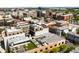 Aerial view of city featuring a view of rooftops, trees, parked cars, and green landscaping at 517 King St # 1, Charleston, SC 29403