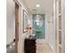 Unique bathroom with vibrant green sink, mosaic tiles, and a glass-enclosed shower at 517 King St # 1, Charleston, SC 29403