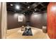 Basement gym featuring light-colored wood floors, a rowing machine, and minimalist decor at 517 King St # 1, Charleston, SC 29403