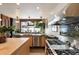 Modern kitchen with stainless steel appliances, ample counter space, and bright lighting at 517 King St # 1, Charleston, SC 29403