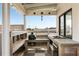 Stylish rooftop outdoor kitchen featuring a grill, sink, and ample counter space for entertaining guests at 517 King St # 1, Charleston, SC 29403