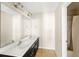 Bathroom featuring dual sinks and a shower/tub combo at 547 Nelliefield Trl, Wando, SC 29492