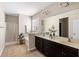 Bathroom featuring dual sinks, a soaking tub, and a walk-in shower at 547 Nelliefield Trl, Wando, SC 29492