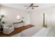 Bedroom with hardwood floors and ensuite bathroom at 547 Nelliefield Trl, Wando, SC 29492