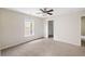 Bedroom featuring neutral carpeting and a ceiling fan at 547 Nelliefield Trl, Wando, SC 29492