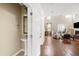 Open entryway with view to the living room, bathroom, and staircase at 547 Nelliefield Trl, Wando, SC 29492