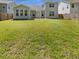 A spacious backyard with a lush green lawn perfect for outdoor activities at 572 Dunswell Dr, Summerville, SC 29486