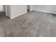 A spacious, carpeted bedroom with neutral walls and a large window is move-in ready at 572 Dunswell Dr, Summerville, SC 29486
