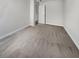 Empty bedroom with neutral carpet, fresh paint, and a five-panel door at 572 Dunswell Dr, Summerville, SC 29486