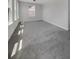 Bonus room featuring soft carpeting, fresh paint, and plenty of natural light at 572 Dunswell Dr, Summerville, SC 29486