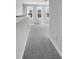Upstairs hallway featuring soft carpeting and three windows with exterior views at 572 Dunswell Dr, Summerville, SC 29486