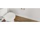 Modern powder room with a white toilet, and beautiful flooring offering a clean and functional design at 572 Dunswell Dr, Summerville, SC 29486