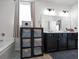 Bathroom boasting double vanity sinks, storage and bathtub at 613 Ravens Wood Rd, Summerville, SC 29486