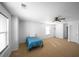 Bright bedroom with ample natural light, carpet flooring, and access to an adjoining space at 613 Ravens Wood Rd, Summerville, SC 29486