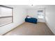 Simple bedroom with a bed, neutral carpet, and natural light from two windows at 613 Ravens Wood Rd, Summerville, SC 29486