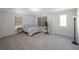 Inviting carpeted bedroom with plenty of natural light and space for relaxation at 613 Ravens Wood Rd, Summerville, SC 29486