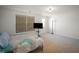Bright bedroom with a television, natural light, and comfortable decor at 613 Ravens Wood Rd, Summerville, SC 29486
