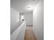 Neutral colored hallway with tan carpet leading to various rooms at 613 Ravens Wood Rd, Summerville, SC 29486