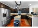 Updated kitchen features stainless steel appliances, granite countertops, and ample storage space at 613 Ravens Wood Rd, Summerville, SC 29486