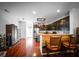 A beautifully lit kitchen with granite countertops and an eat-in bar at 613 Ravens Wood Rd, Summerville, SC 29486