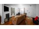 Inviting living room with a fireplace, cozy seating, and ample natural light at 613 Ravens Wood Rd, Summerville, SC 29486
