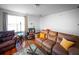 Comfortable living room featuring natural light and cozy furniture at 613 Ravens Wood Rd, Summerville, SC 29486