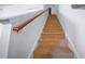 Carpeted stairway with wooden handrail leading to upper floor at 613 Ravens Wood Rd, Summerville, SC 29486