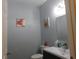 Clean powder room featuring attractive vanity, fixtures and decor at 8800 Dorchester Rd # 2902, North Charleston, SC 29420