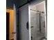 Modern bathroom with frameless glass enclosed shower and stylish barn door at 8800 Dorchester Rd # 2902, North Charleston, SC 29420