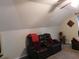 Second bonus room view with recliner seating under vaulted ceiling and a ceiling fan at 8800 Dorchester Rd # 2902, North Charleston, SC 29420